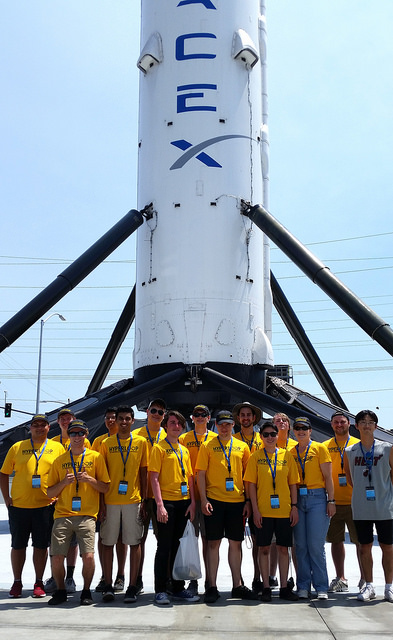 Hyperloop Team in front of SpaceX Rocket