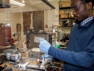 Functional Materials and Devices Lab Student Working on Polymers
