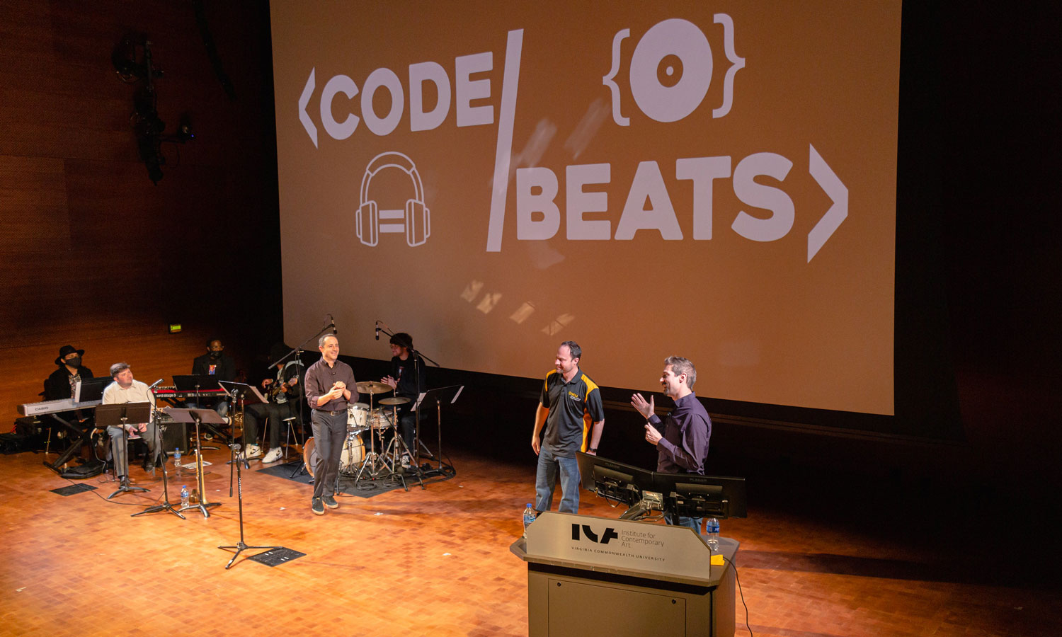 Students and faculty on stage at the ICA for the Code Beats event