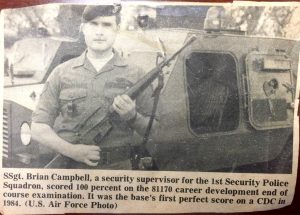 A newspaper clipping of U.S. Air Force Staff Sgt. Brian Campbell in uniform.