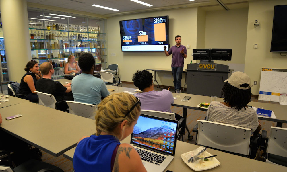Matthew Teachey, who developed a craft beer delivery service through VCU's Pre-Accelerator Program, talks about his experience to VCU students in this year's Pre-X program.