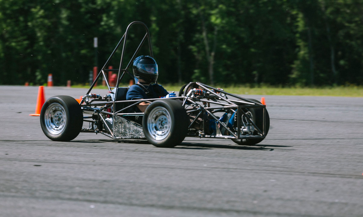 Chad Brown, a rising sophomore majoring in mechanical engineering, test drives VCU’s newest Formula-style race car
