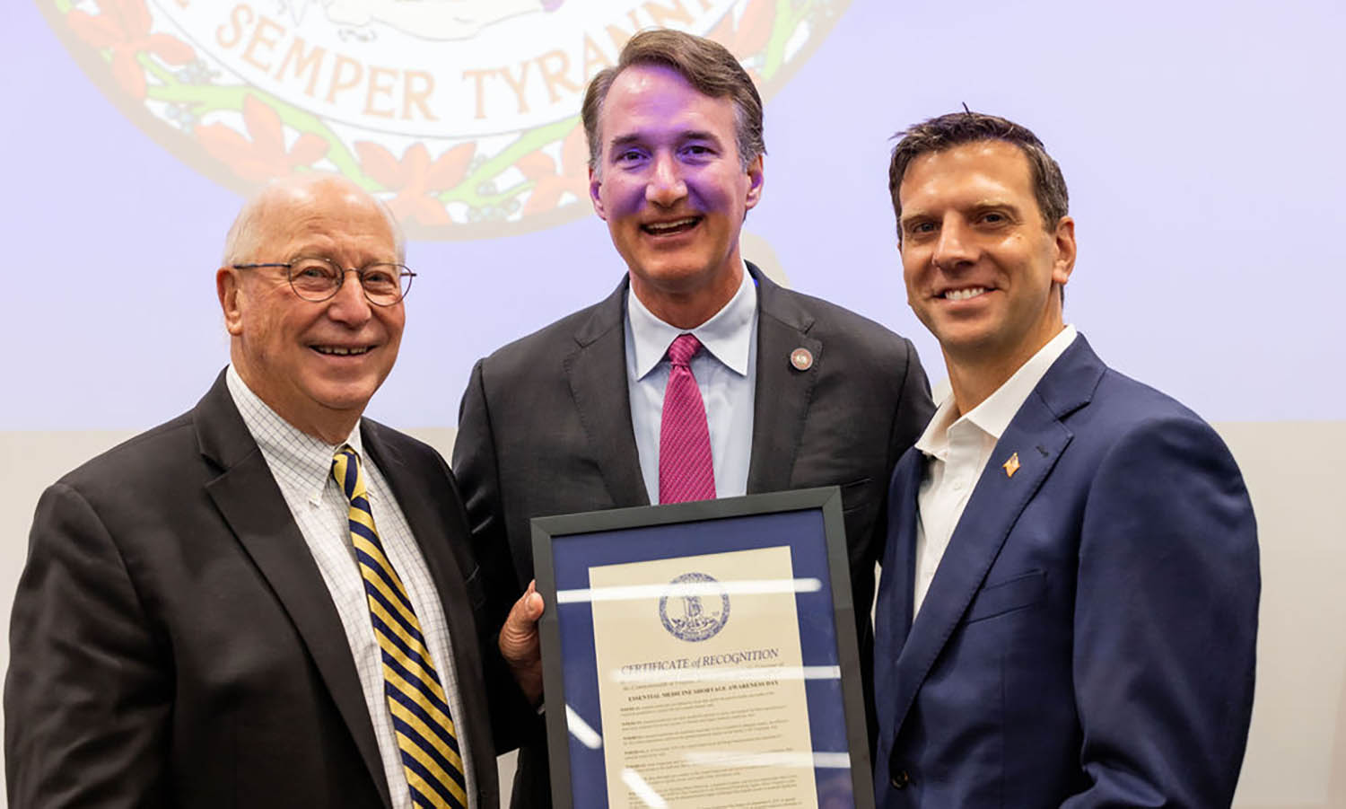 From left: B. Frank Gupton, Ph.D., CEO of Medicines for All Institute (M4ALL) based at Virginia Commonwealth University's College of Engineering and Chair, Chemical and Life Science Engineering; Governor Glenn Youngkin; Eric Edwards, M.D., Ph.D., President, Co-founder, and CEO of Phlow.