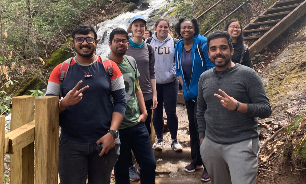 A group of students hiking in the mountains