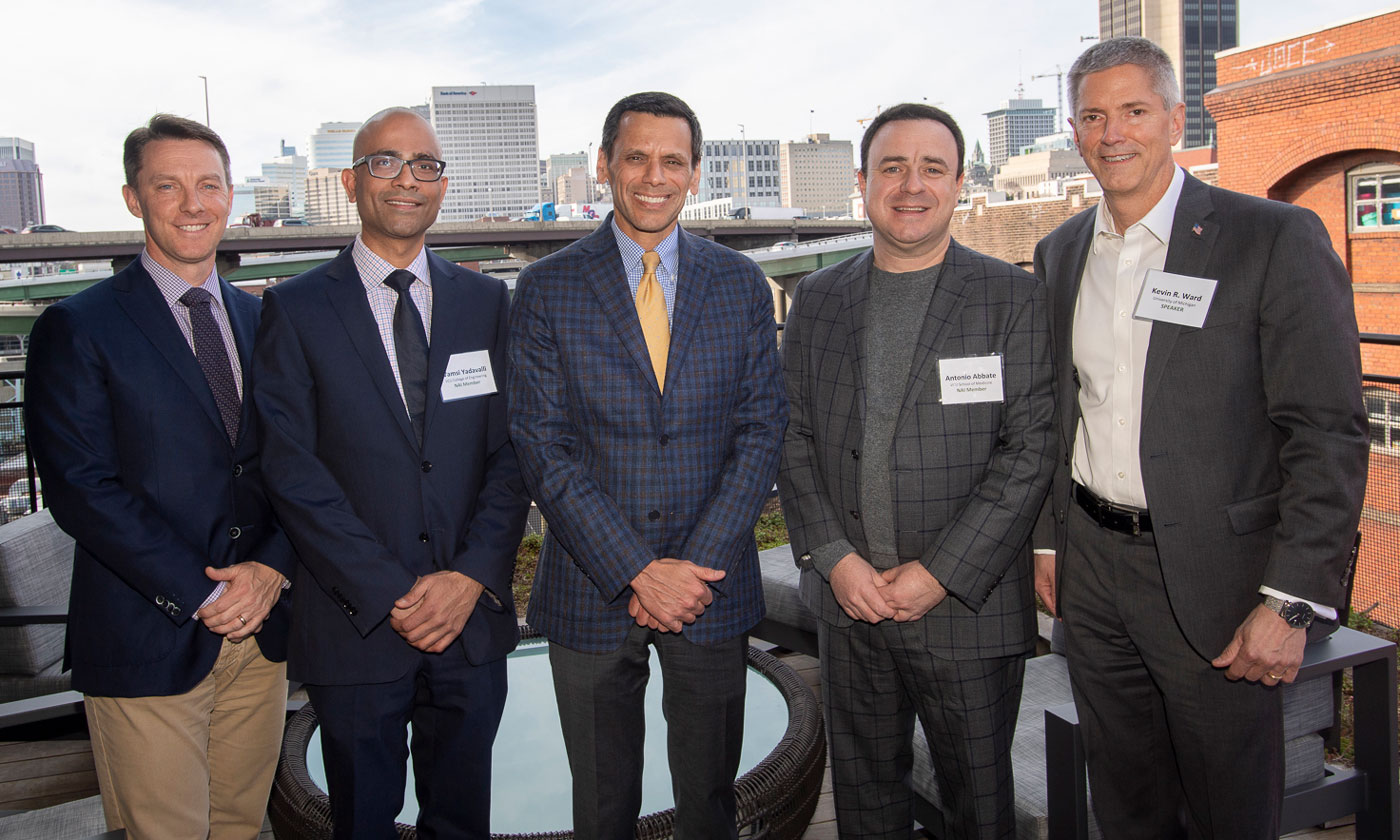 NAI inductees Jason Carlyon (far left), Vamsi Yadavalli and Antonio Abbate (second from right), with VCU President Michael Rao (middle) and keynote speaker Kevin Ward (far right). (Tom Kojcsich, University Marketing)