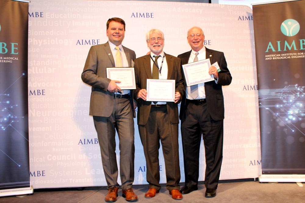 Lukasz Kurgan, Ph.D., Gregory Buck, Ph.D., and B. Frank Gupton, Ph.D., at the AIMBE College of Fellows induction ceremony. 
