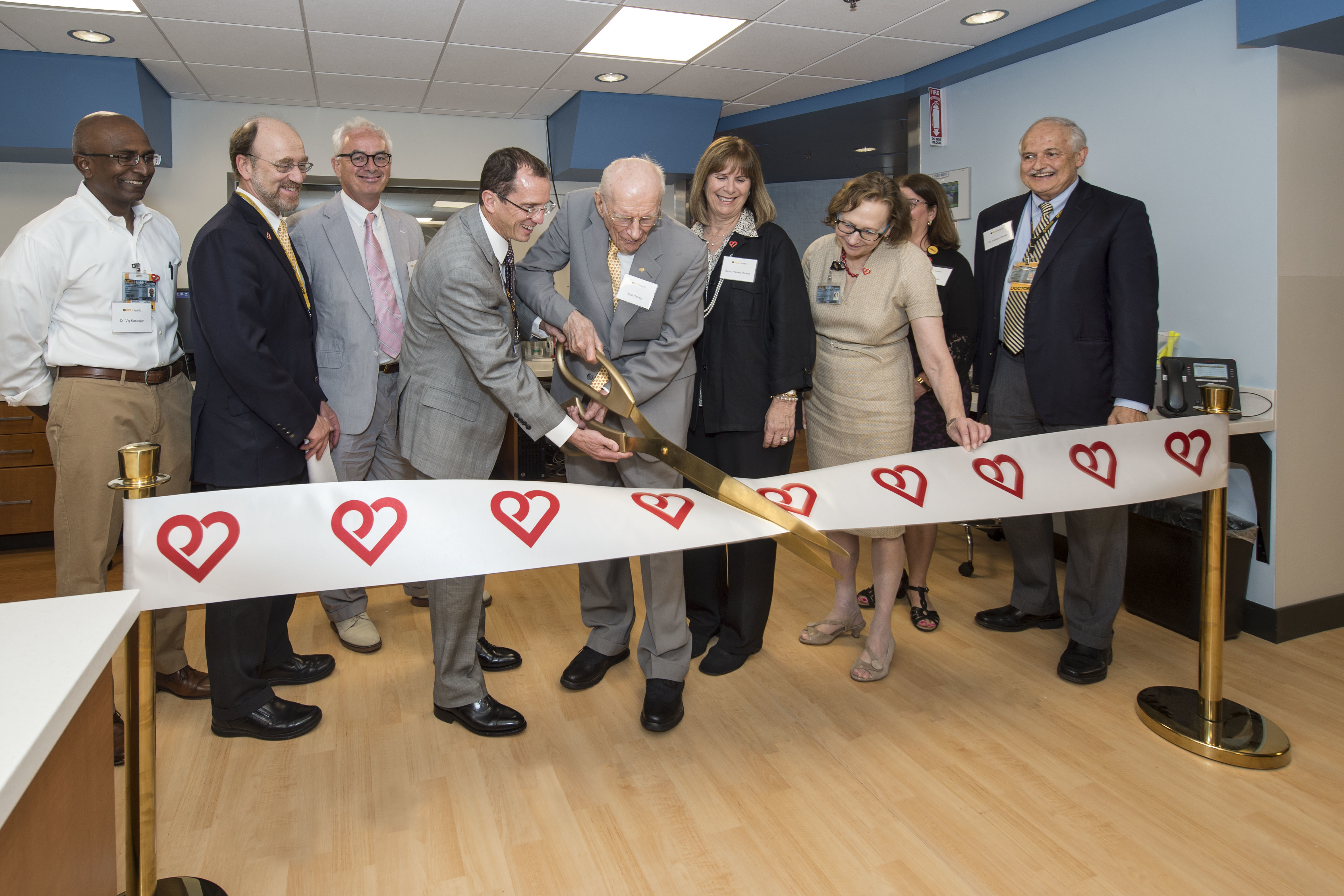 Pauley and VCU Health leaders cut the ribbon on a new cardiac imaging suite at the Pauley Heart Center in 2018. (Kevin Morley, University Marketing)