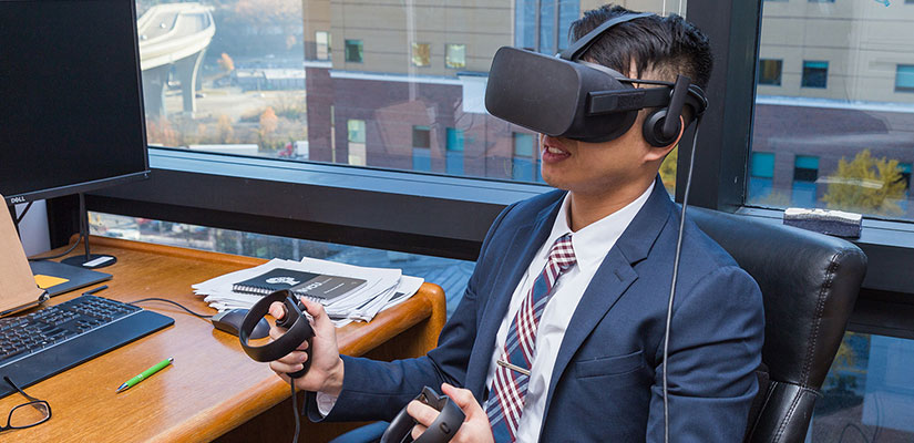 VCU Pre X student David Vu using a virtual reality device