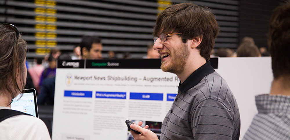 Computer science graduate Nathaniel Ingram discusses the augmented reality app that his team developed at the 2018 Capstone Design Expo.